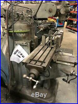 Bridgeport Milling Machine 42 with 1-1/2 HP variable speed spindle. Power feed